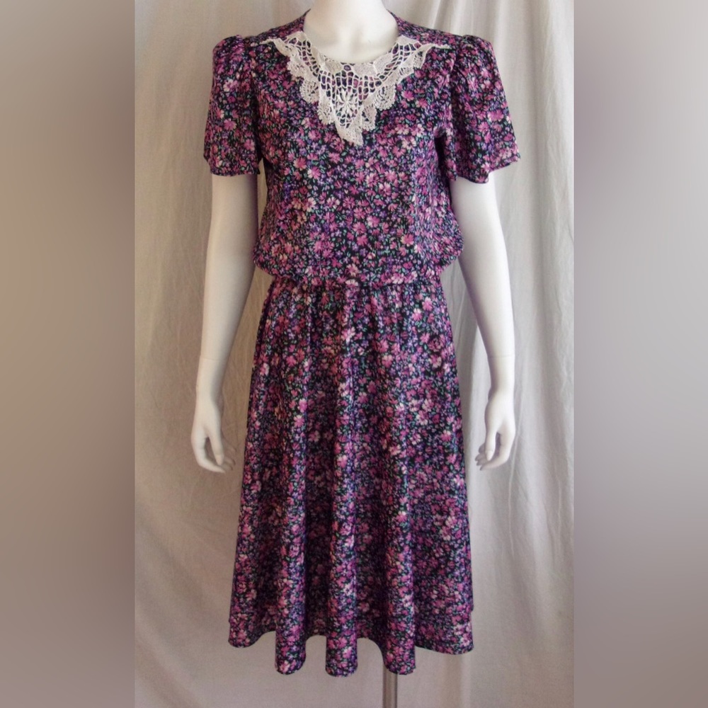 Classic Apparel dress Size 16W floral printing not new but good condition.